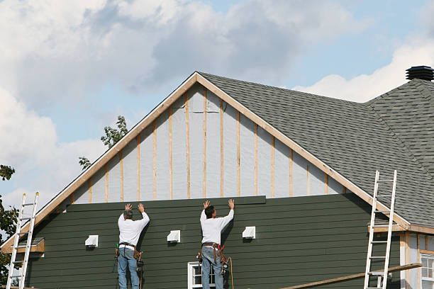 Professional Siding Replacement technician working in Rising Sun, IN